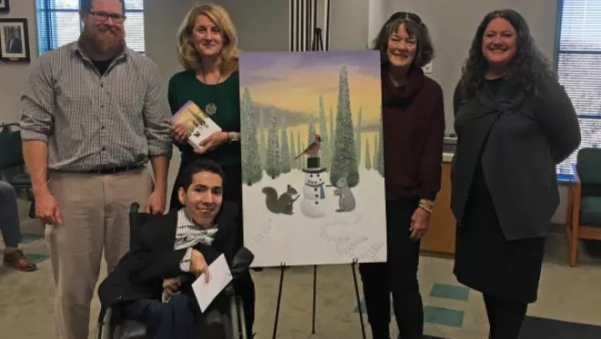 澳门线上博彩 awards Jose Ramirez $500 and 25 printed cards for his 2018 Holiday Card design.